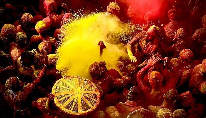 People celebrating Holi in Shri Bnake Bihari Mandir