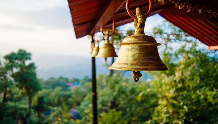 Ring the bell at the entrance of the temple to seek the blessings.