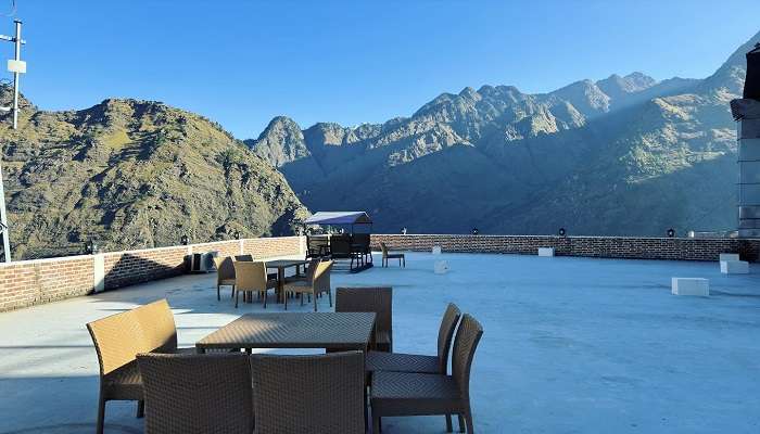 Witness The beautiful Landscape from the roof top restaurant at The Tattva Resort in Joshimath