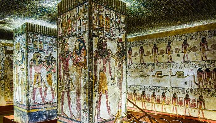 A glimpse into the upper hall adorned with pillars inside the age-old tomb of Seti I