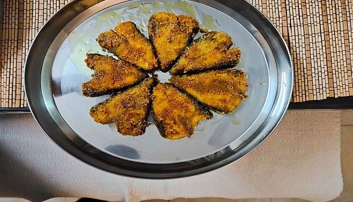 Try the Andhra Style Fish Fry at Lawson’s Bay Beach