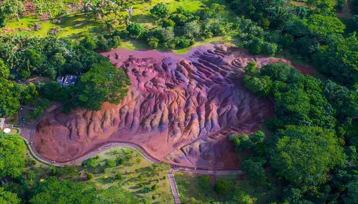 The Seven coloured earth of Chamarel is a naturally occurring phenomenon due to basalt weathering.