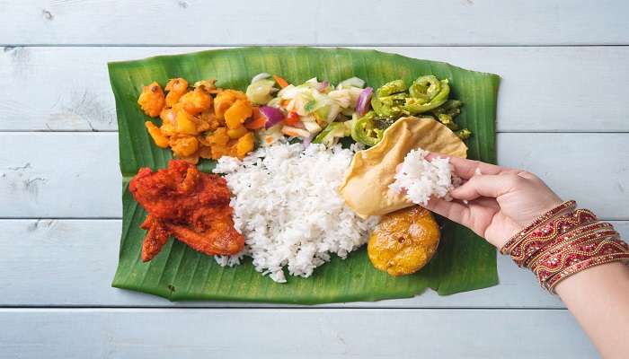 Exploring Kerala Cuisine is one of the best things to do near Cherai Beach