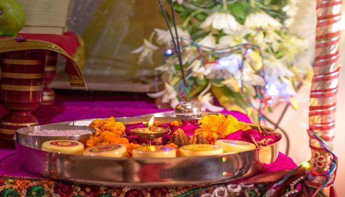 Tourists visiting Bekhli Temple in Kullu offer their prayers 