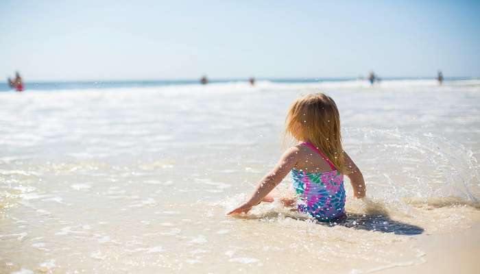 Enjoy sunbathing and swimming in beach