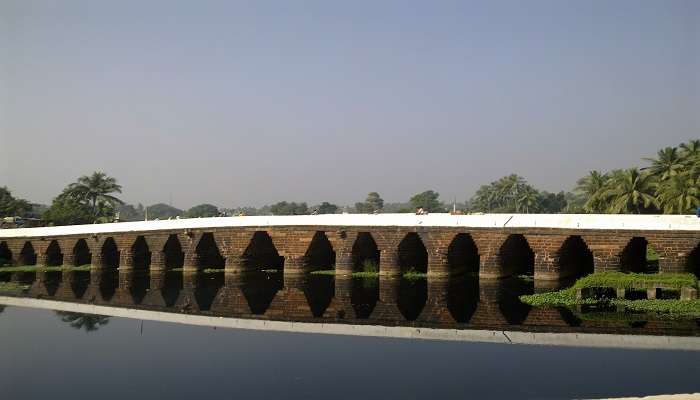Atharanala is a historic laterite stone bridge over the Madhupurstream