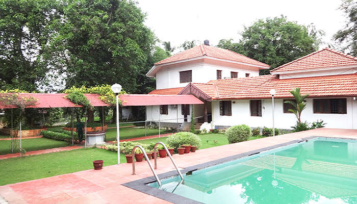 Surrounded by lush greenery, Ayuryogashram Heritage is a sanctuary of peace and tranquility.