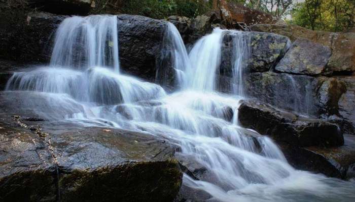 enjoy serene water at the Jalatarangini waterfalls and visit during the best time. 