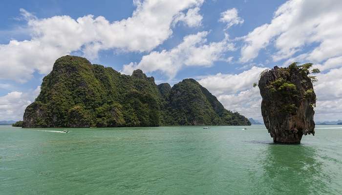 Located on the northeast side of Phuket, Khao Phing Kan Island stands all blue and green with a smooth white sand backdrop