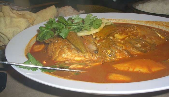 Fried fish with curry and rice served at Cherai Beach Restaurants
