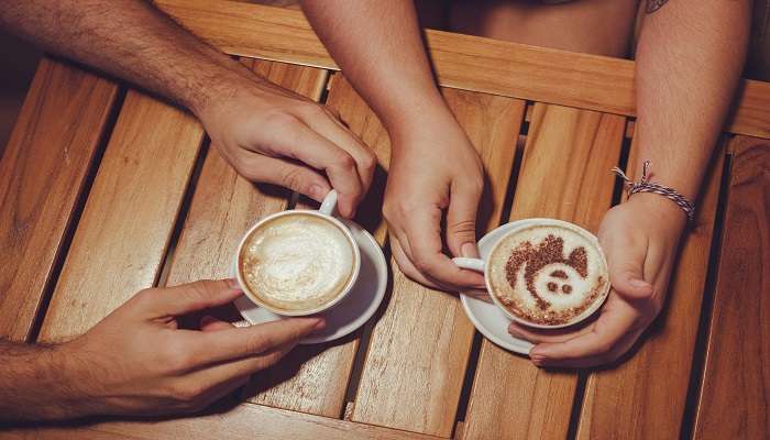 Enjoy a delicious cappuccino with white foam at Cuppa Redefined, the best cafe in Mysore.