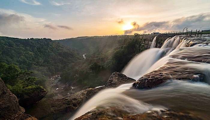 Witness the beauty of Dainthlen Falls during monsoon.