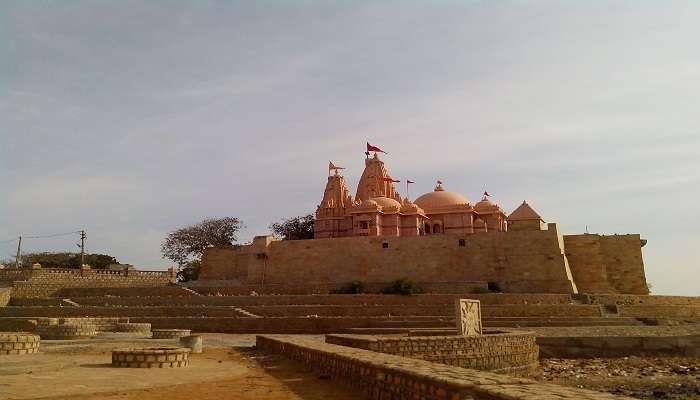 Entrance to Koteshwar Cave Temple with intricate carvings