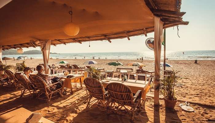 Tourists relaxing in restaurants near Agonda Beach a chilling ocean beach