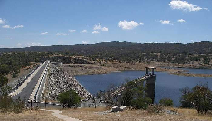 Scenic view of Googong Dam surrounded by natural landscapes