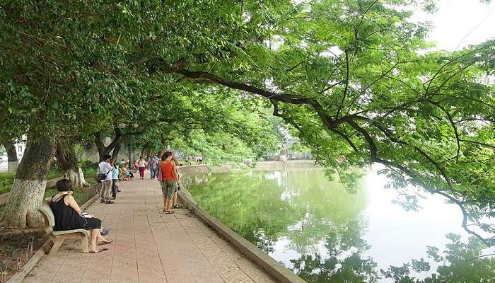 visit Hoan Kiem Lake to sit back and relax.