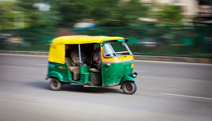 A picture of an Auto Rickshaw travelling to Aminabad Market In Lucknow