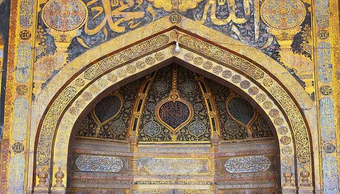 The beautiful decorations on the mihrab, a tourist place in Bijapur