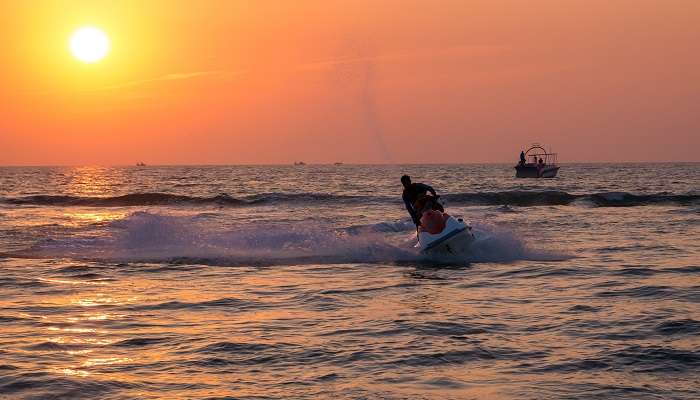 Feel the rush of a jet ski adventure at Mobor Beach in Goa.