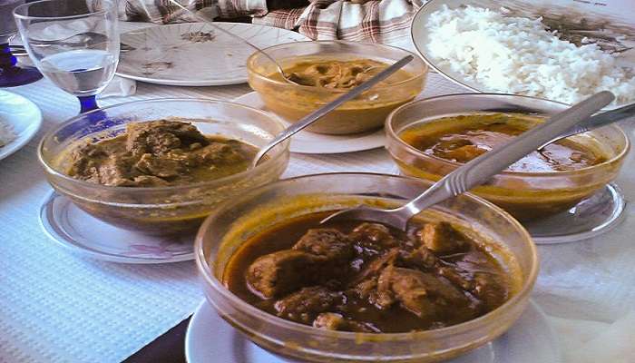 he cuisine of Goa originated as an amalgamation of its Konkani and Portuguese cuisines