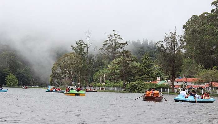 Boating in Kodaikanal Lake amidst mist
