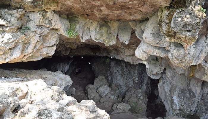 Mawsmai Cave in Cherrapunjee, near Khasi Monoliths has a very narrow entrance.