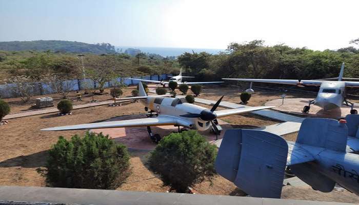 A fleet of planes parked on the grounds of the Naval Aviation Museum 