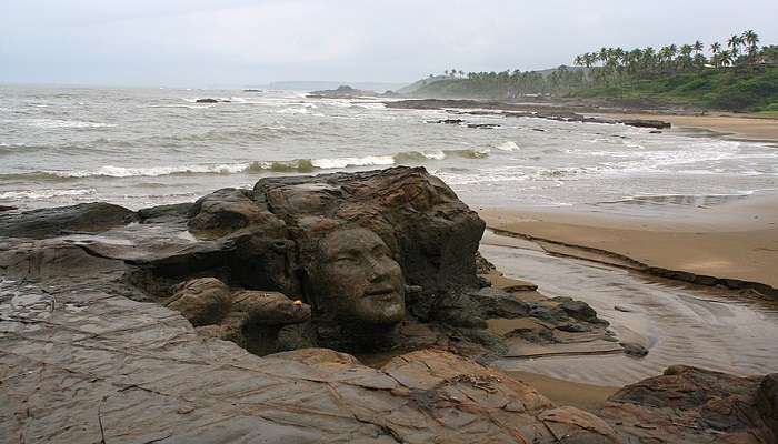Ozran (Little Vagator beach) with the rock carving of Lord Shiva.