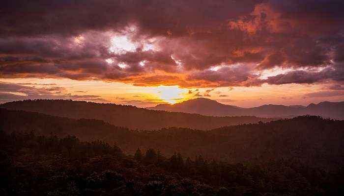 A beautiful sunset view from Pagoda Point Yercaud, with the sky painted in vibrant hues.