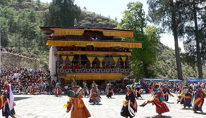 Masked dance performances during Paro Tsechu Festival.