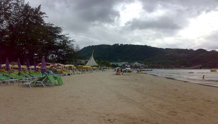 Sun loungers and umbrellas on Patong Beach in Phuket.