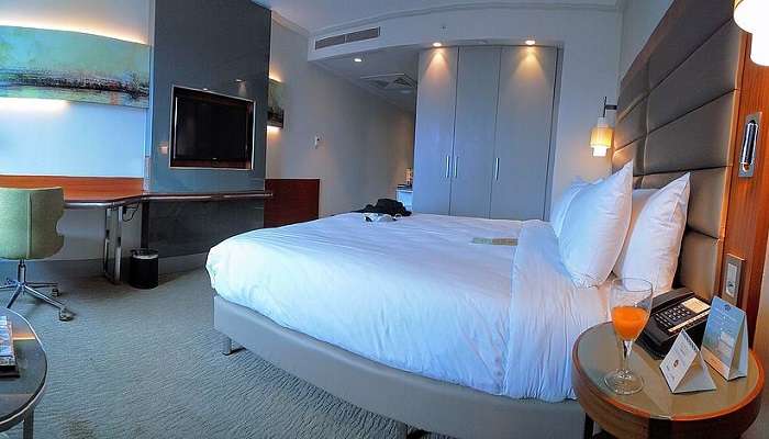 Interiors of a deluxe room in a hotel,  Hotels In Marathahalli 