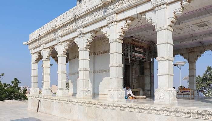Intricate carvings and pillars of Takhteshwar Temple showcasing its architectural beauty.