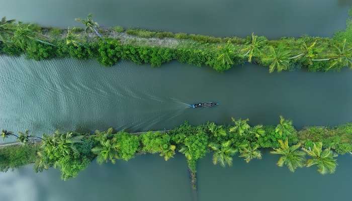 Aerial shot boat at Alleppey (Alappuzha) Kumarakom backwaters in Kerala
