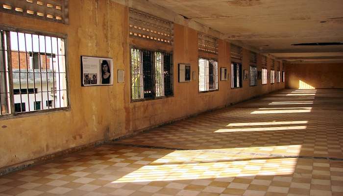Explore the historical Tuol Sleng Genocide Museum that is near Tuol Tompoung Market