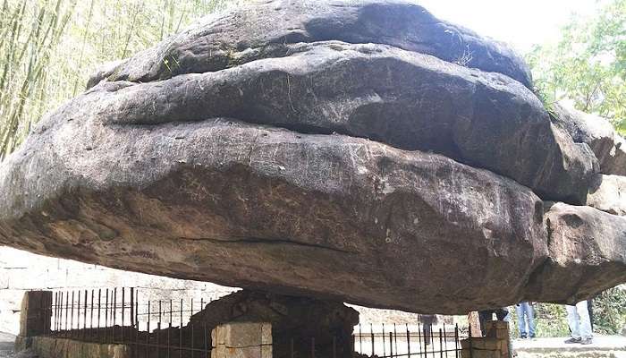 Visit the mysterious balancing rock is one of the best things to do in Mawlynnong