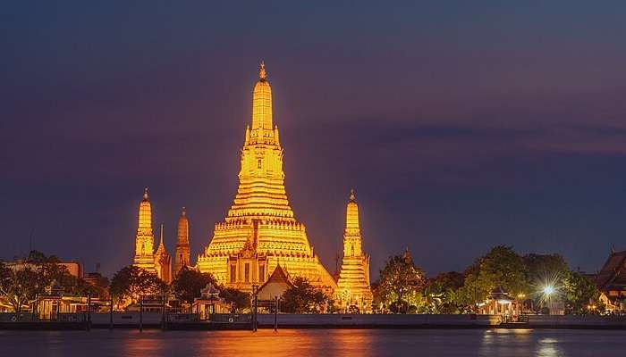Wat Arun Temple in Bangkok in February, highlighting its architectural beauty.