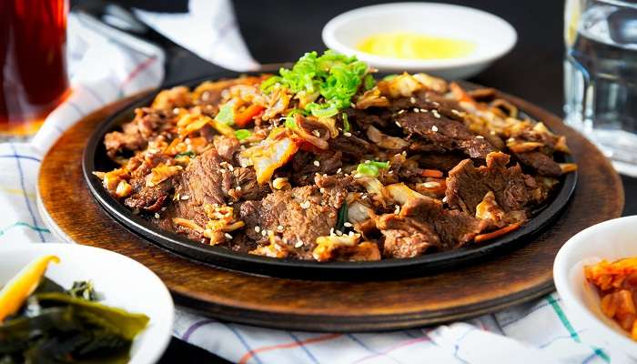 A plate of meat dish in a restaurant