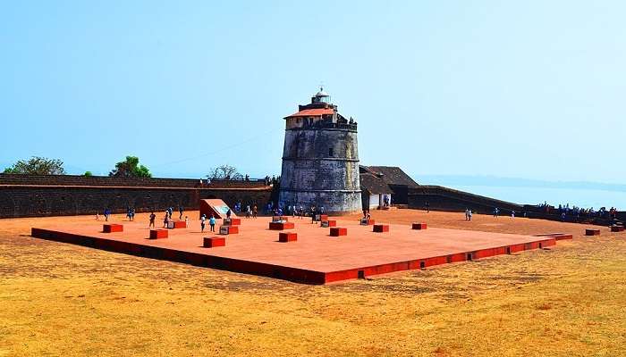 The view of the majestic Aguada Fort at the Arabian Sea from a drone