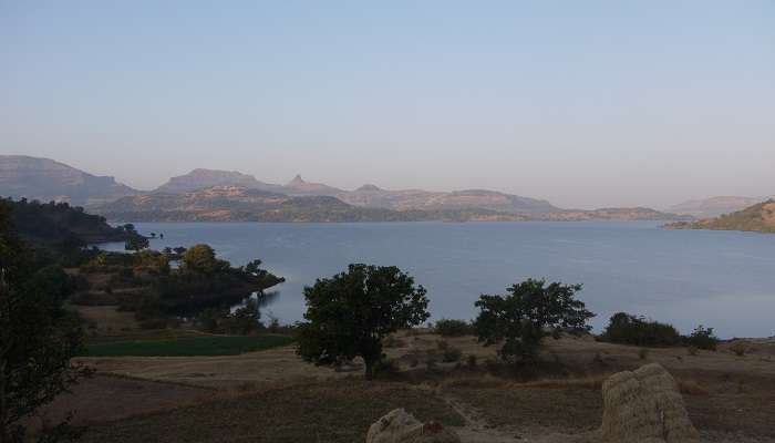 visit the most enchanting Arthur Lake offers a calm and serene waterscape near Umbrella Waterfalls 