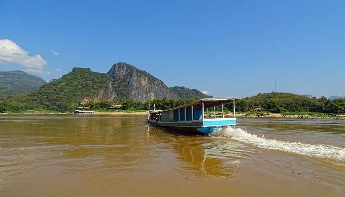 Boat rowing through the Mekong River