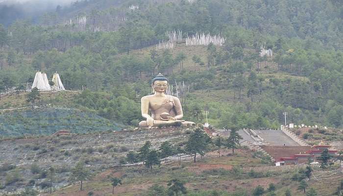 Massive golden Buddha statue near Tashichho Dzong. 