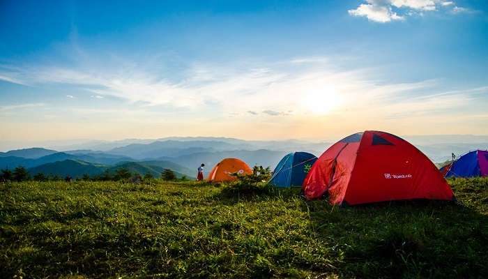 Camping setup on a car roof in Chopta Valley Sikkim.