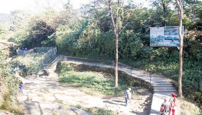 People walking towards Davis Falls in Pokhara Nepal