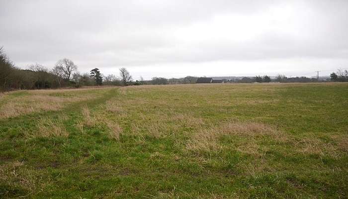 Near Woodend, the countryside charms with its rolling hills and lush greenery.