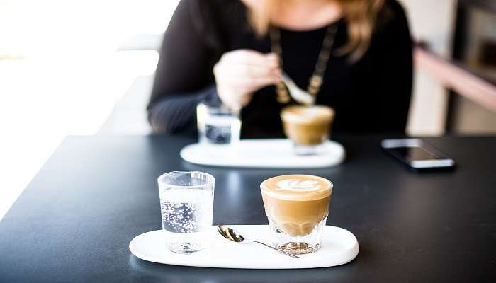 A person enjoying coffee at El Gordo cafe, Bendigo