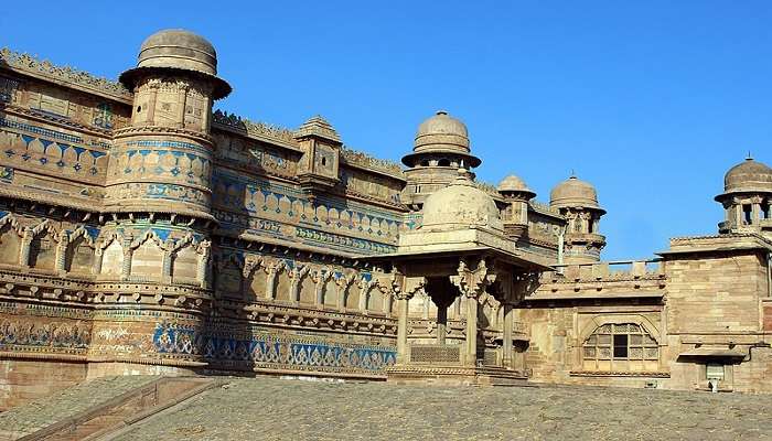 Visit the majestic Gwalior Fort near Bhoora Khon Waterfall.