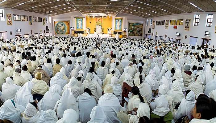 People meditating at Brahma Kumaris campus