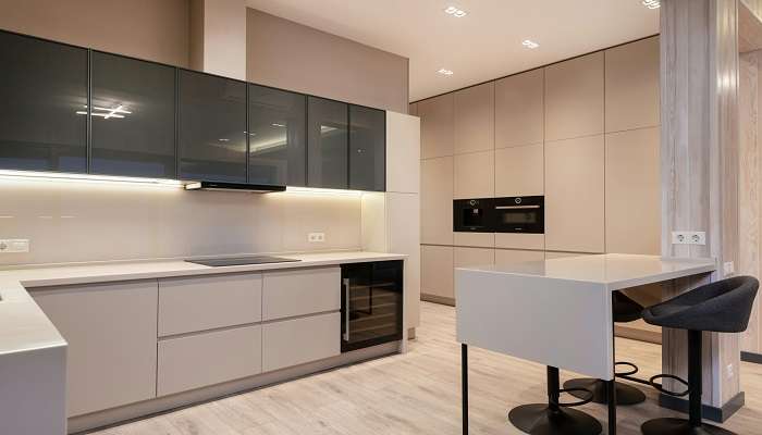 Modern kitchen in the room of the hotels in Vadavalli.