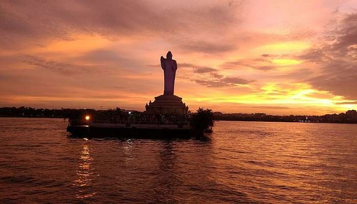 Sit at Hussain Sagar Lake which is a place near Charminar Hyderabad